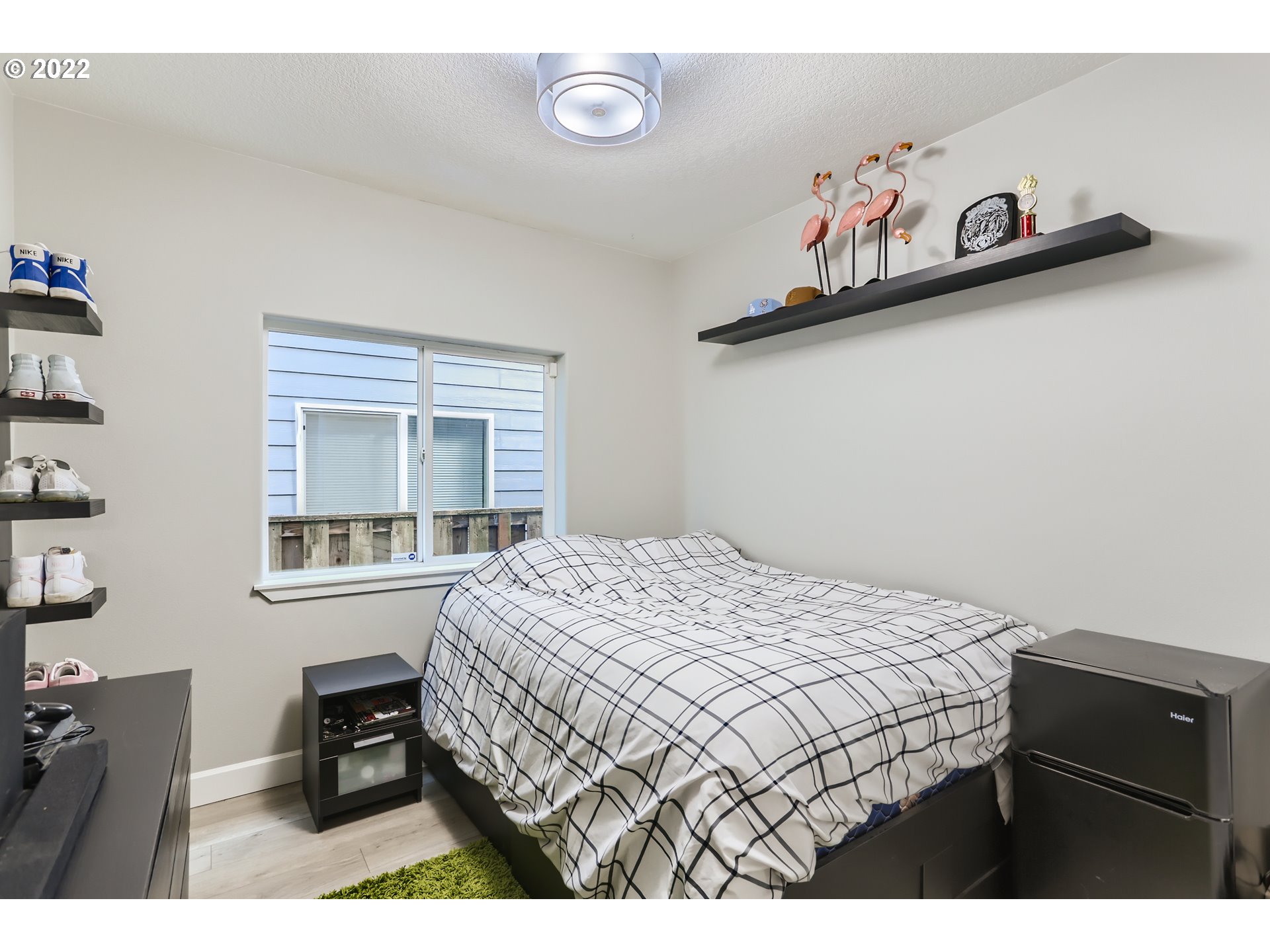 16603 Southwest 134th Terrace Portland, OR 97224 - Photo 15 of 30 a bedroom with a bed and dresser