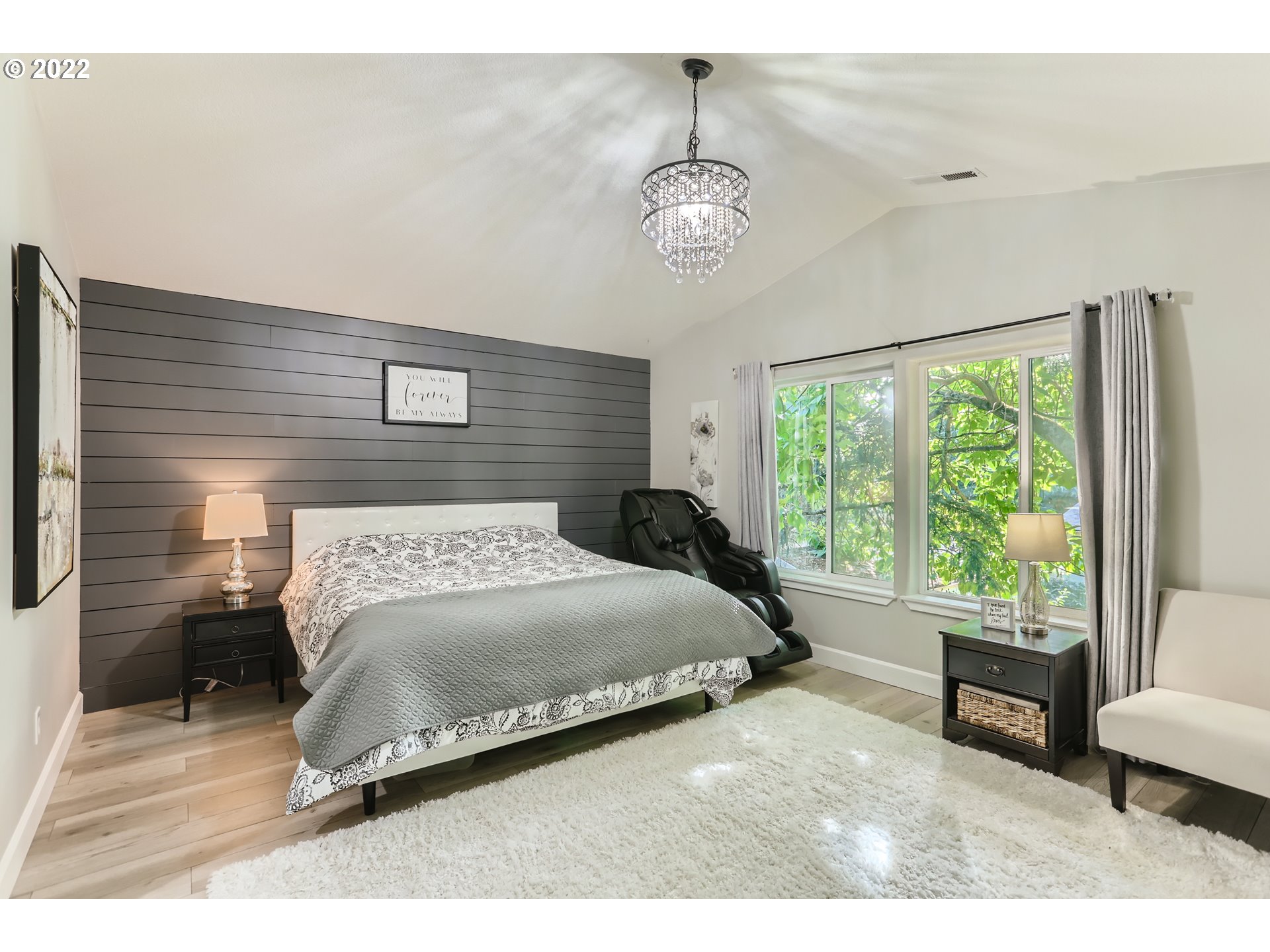 16603 Southwest 134th Terrace Portland, OR 97224 - Photo 16 of 30 a bedroom with a large bed and a large window