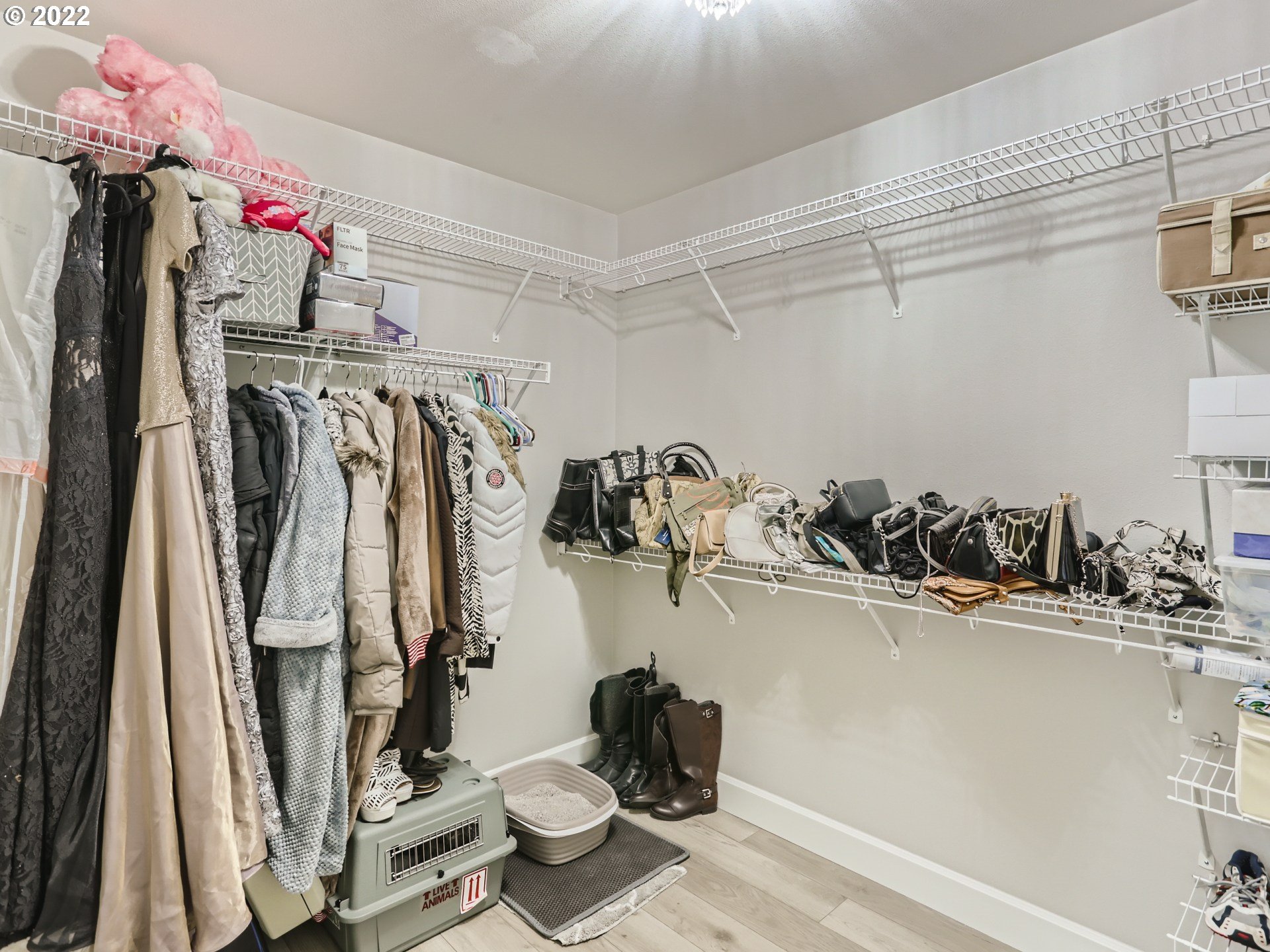 16603 Southwest 134th Terrace Portland, OR 97224 - Photo 29 of 30 a view of walk in closet with clothes and shoes