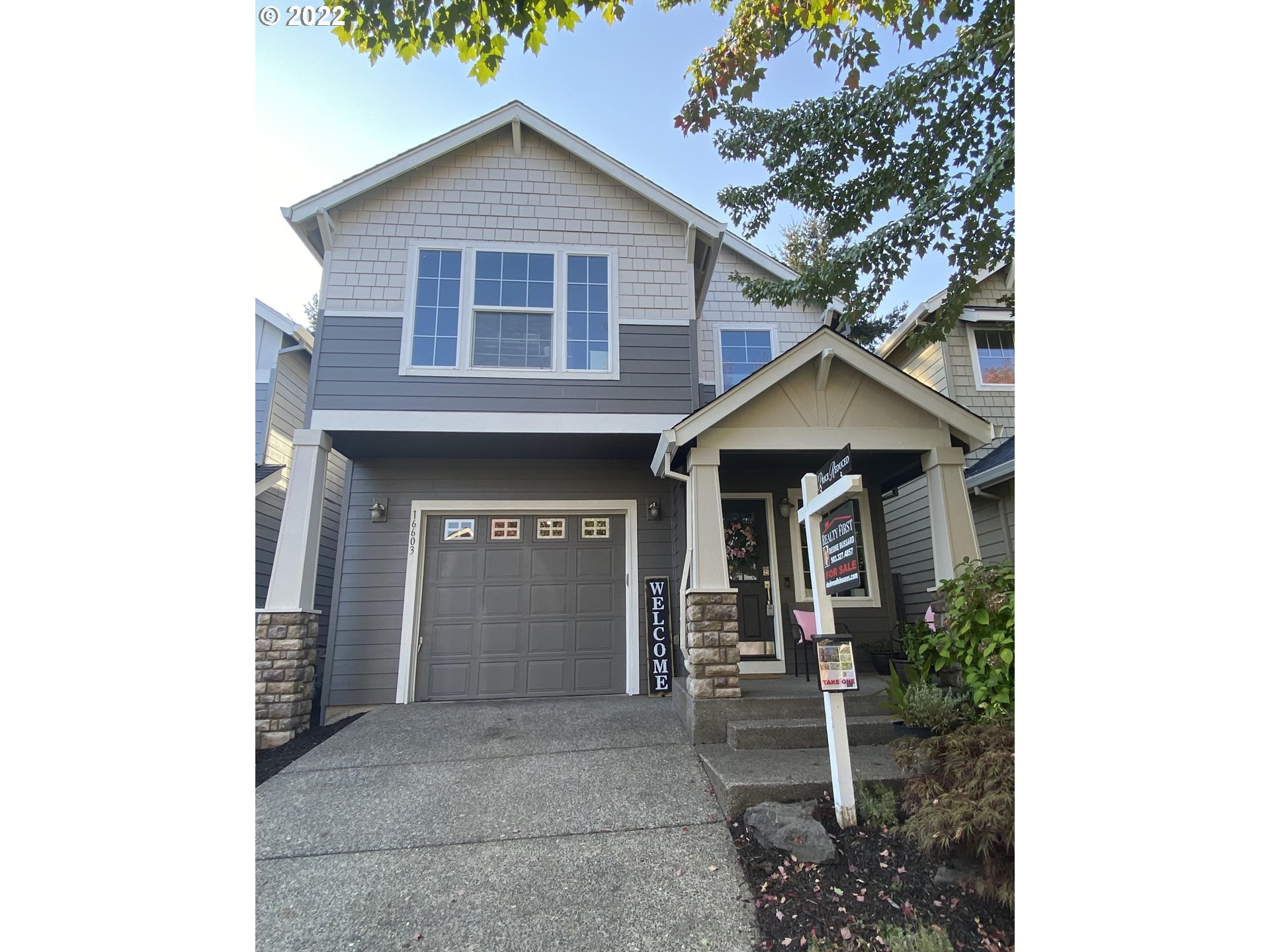 16603 Southwest 134th Terrace Portland, OR 97224 - Photo 3 of 30 a front view of a house with a yard