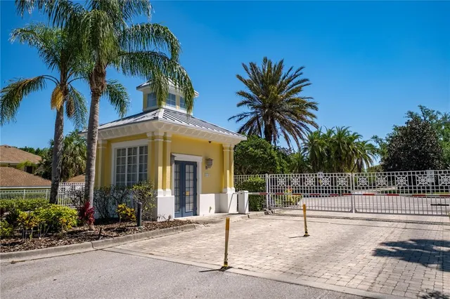 a view of a chair and table in the patio