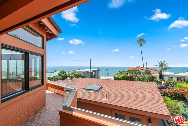 a view of a patio with chairs