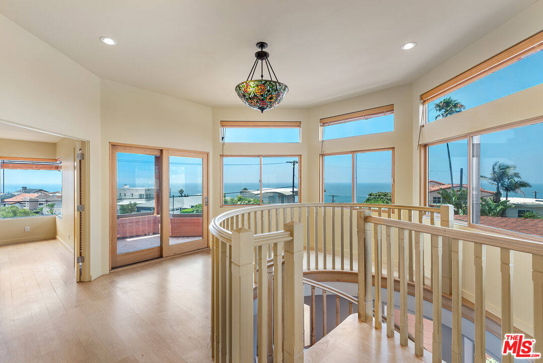 7220 Rindge Avenue Playa del Rey, CA 90293 - Photo 37 of 53 a view of a livingroom with furniture window wooden floor and garden