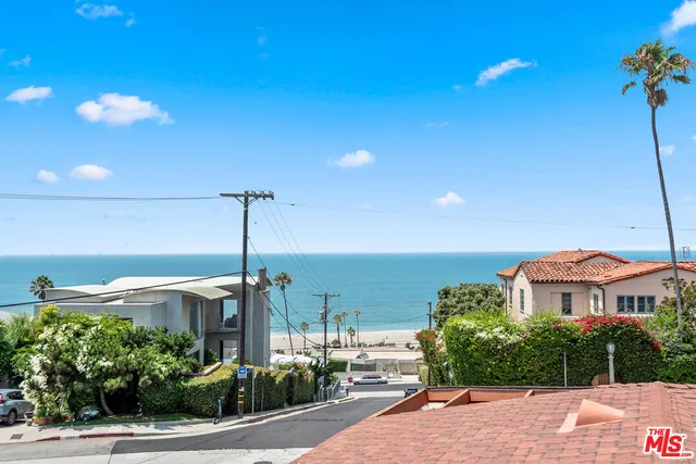 a front view of a house with garage