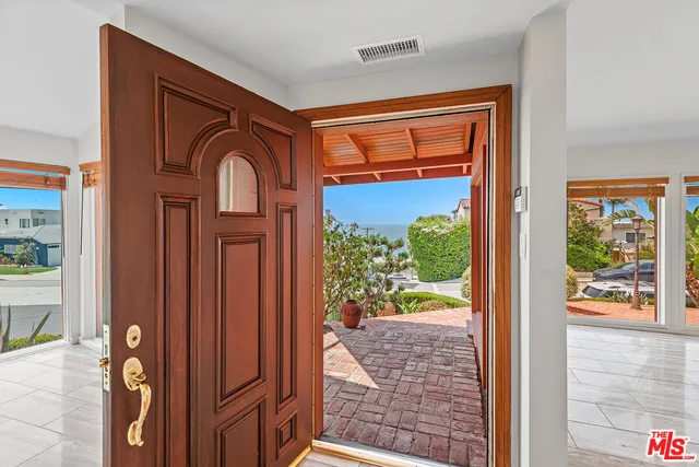 a view of a door and a windows