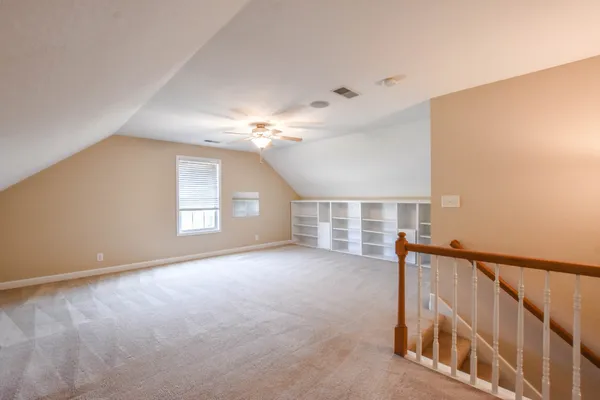 a view of a livingroom with a staircase