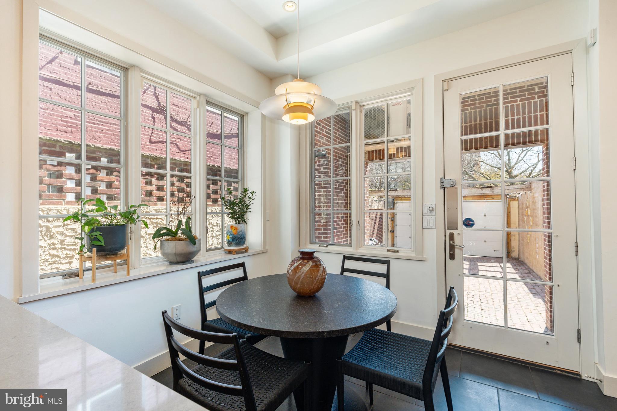 632 Spruce Street Philadelphia, PA 19106 - Photo 28 of 88 a view of a dining room with furniture window and wooden floor