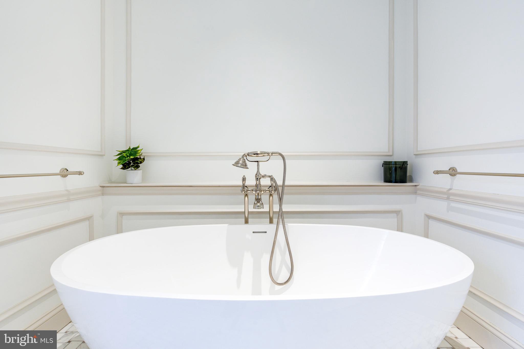 632 Spruce Street Philadelphia, PA 19106 - Photo 40 of 88 a white bath tub sitting in a bathroom