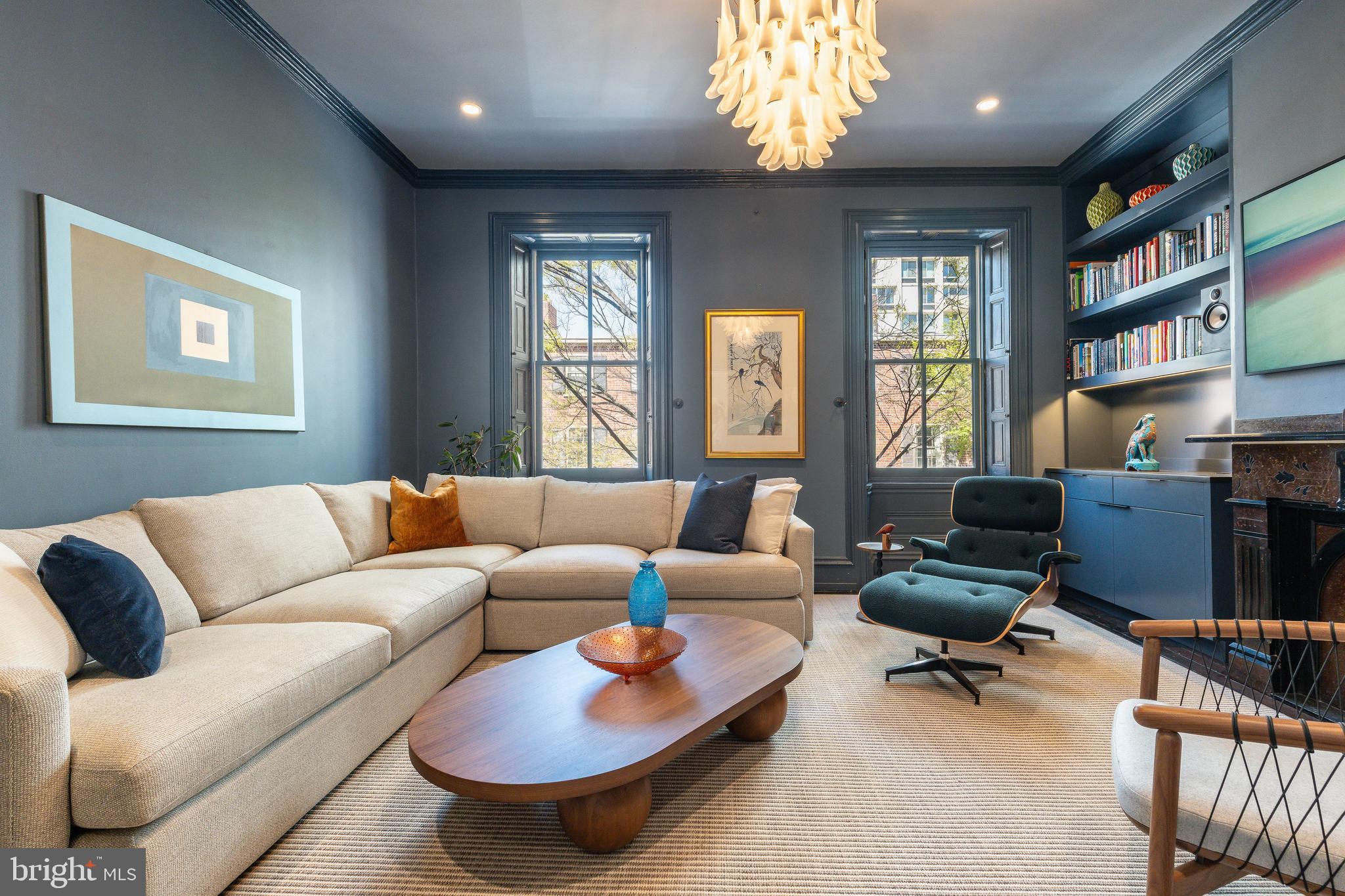632 Spruce Street Philadelphia, PA 19106 - Photo 43 of 88 a living room with furniture a bookshelf and a window
