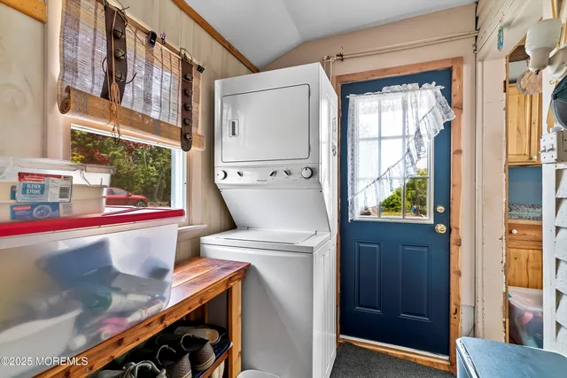 a view of bathroom with a toilet and a shower