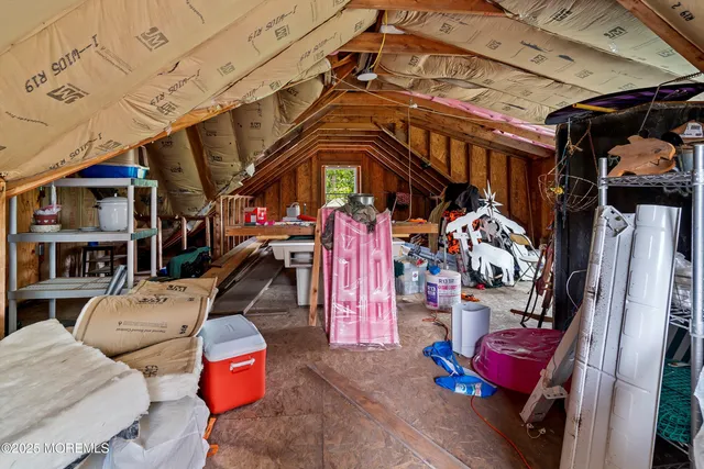 a view of a chairs in back of building