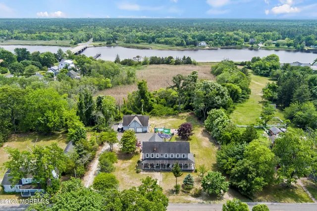 an aerial view of a house with garden space and outdoor space