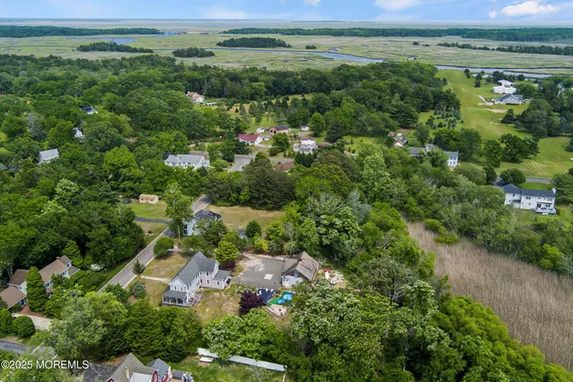 an aerial view of a city with lots of residential buildings