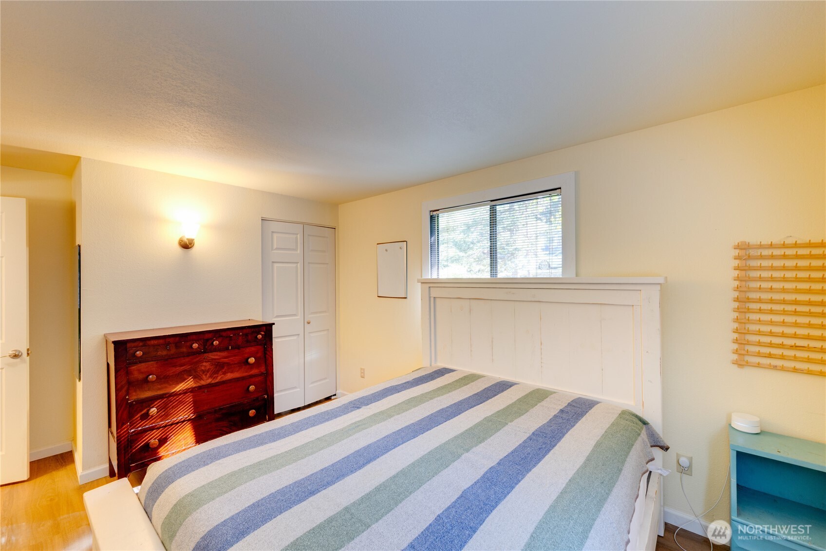 2872 Hi Crest Road Langley, WA 98260 - Photo 22 of 33 a bedroom with a bed and a dresser