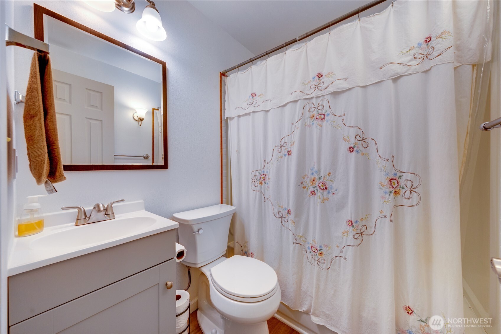 2872 Hi Crest Road Langley, WA 98260 - Photo 24 of 33 a bathroom with a sink a toilet and a mirror
