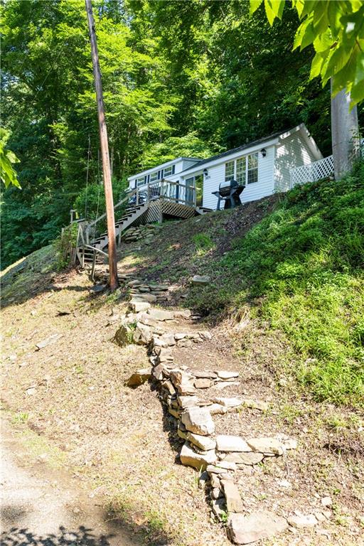 2675 Lakeview Road Confluence, PA 15424 - Photo 19 of 25 a view of a house with a yard