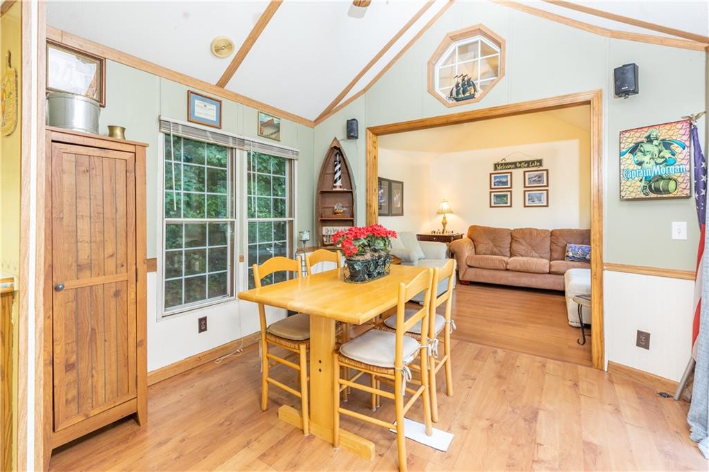 2675 Lakeview Road Confluence, PA 15424 - Photo 10 of 25 a view of a dining room with furniture window and wooden floor