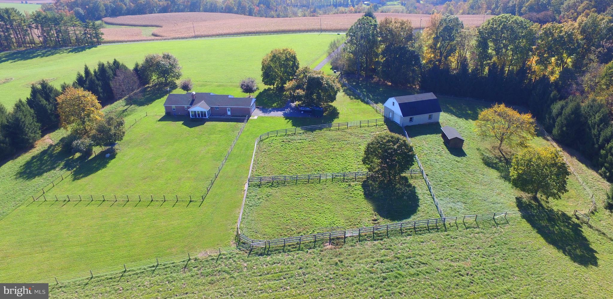 4924 Old Quarter Road Upperco, MD 21155 - Photo 25 of 28 View looking south. 3 oak board paddocks to right