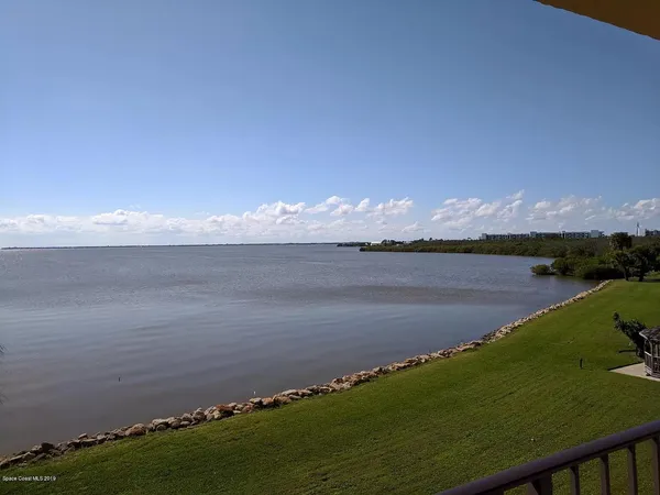 a view of an ocean from a balcony