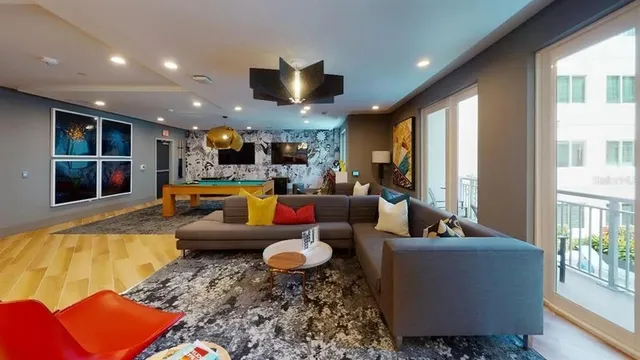 a kitchen with a refrigerator and a stove