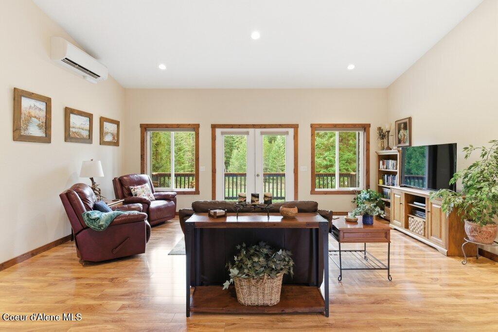 24414 North Wendler Loop Rathdrum, ID 83858 - Photo 5 of 49 Main floor family room