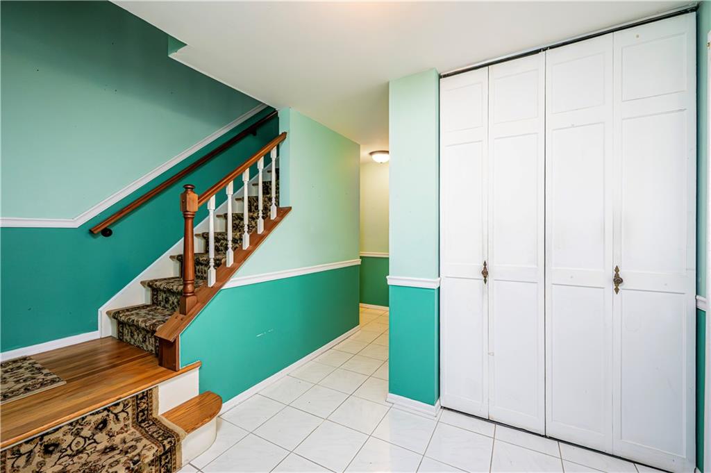 3221 Attleboro Road Greensburg, PA 15601 - Photo 17 of 38 a view of entryway with wooden floor and stairs