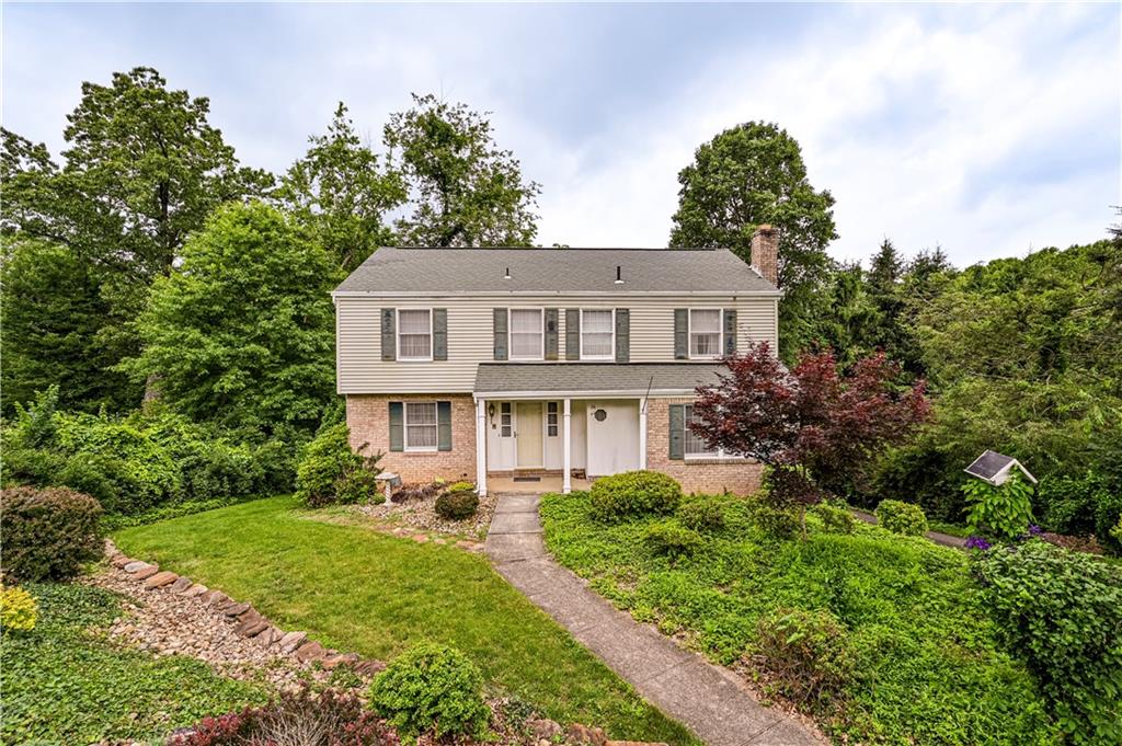 3221 Attleboro Road Greensburg, PA 15601 - Photo 2 of 38 a front view of a house with a yard