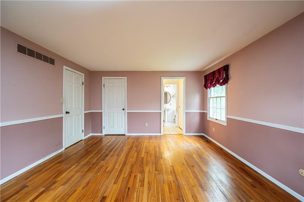 3221 Attleboro Road Greensburg, PA 15601 - Photo 21 of 38 a view of a big room with wooden floor and windows