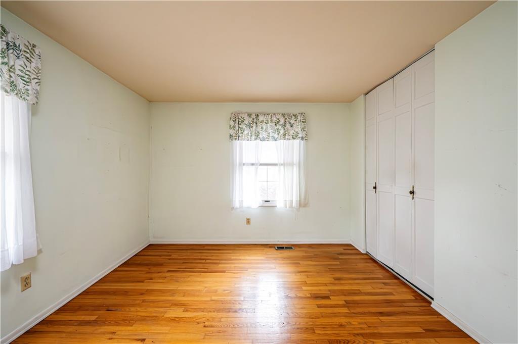 3221 Attleboro Road Greensburg, PA 15601 - Photo 26 of 38 a view of empty room with wooden floor and fan
