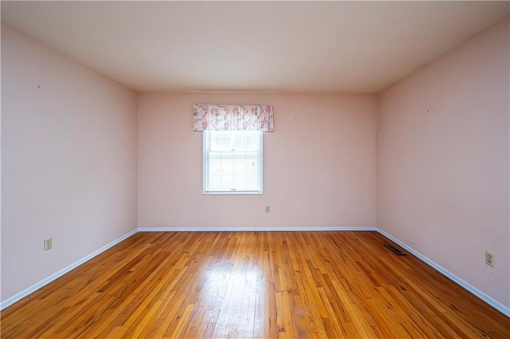 3221 Attleboro Road Greensburg, PA 15601 - Photo 30 of 38 a view of empty room with wooden floor and fan