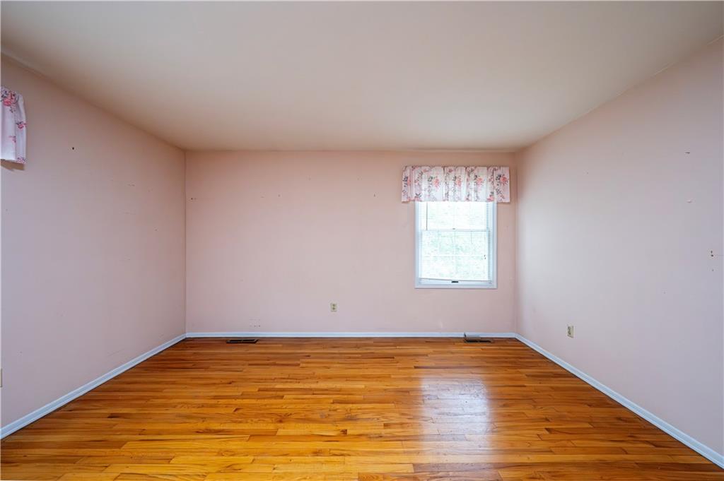 3221 Attleboro Road Greensburg, PA 15601 - Photo 31 of 38 a view of empty room with wooden floor and fan