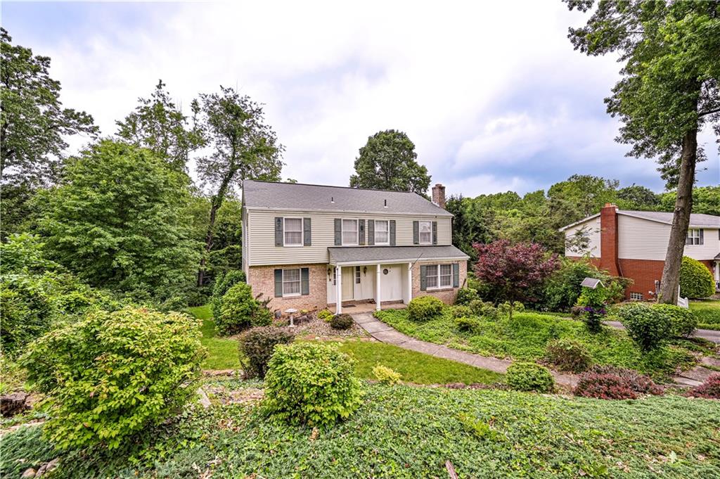 3221 Attleboro Road Greensburg, PA 15601 - Photo 38 of 38 a front view of a house with a yard and lake view