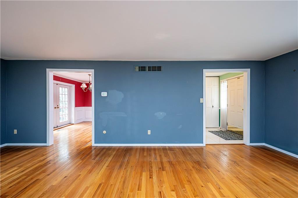 3221 Attleboro Road Greensburg, PA 15601 - Photo 7 of 38 a view of an empty room with wooden floor and closet