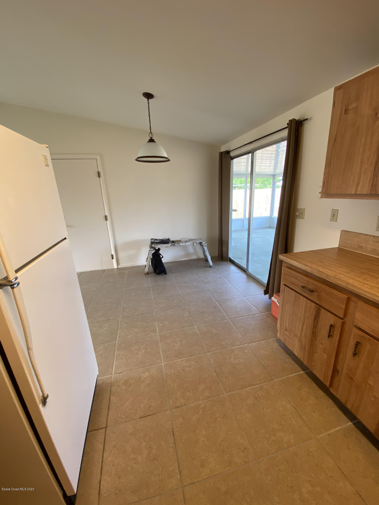 889 Bianca Drive Northeast Palm Bay, FL 32905 - Photo 5 of 12 a view of a storage in a room