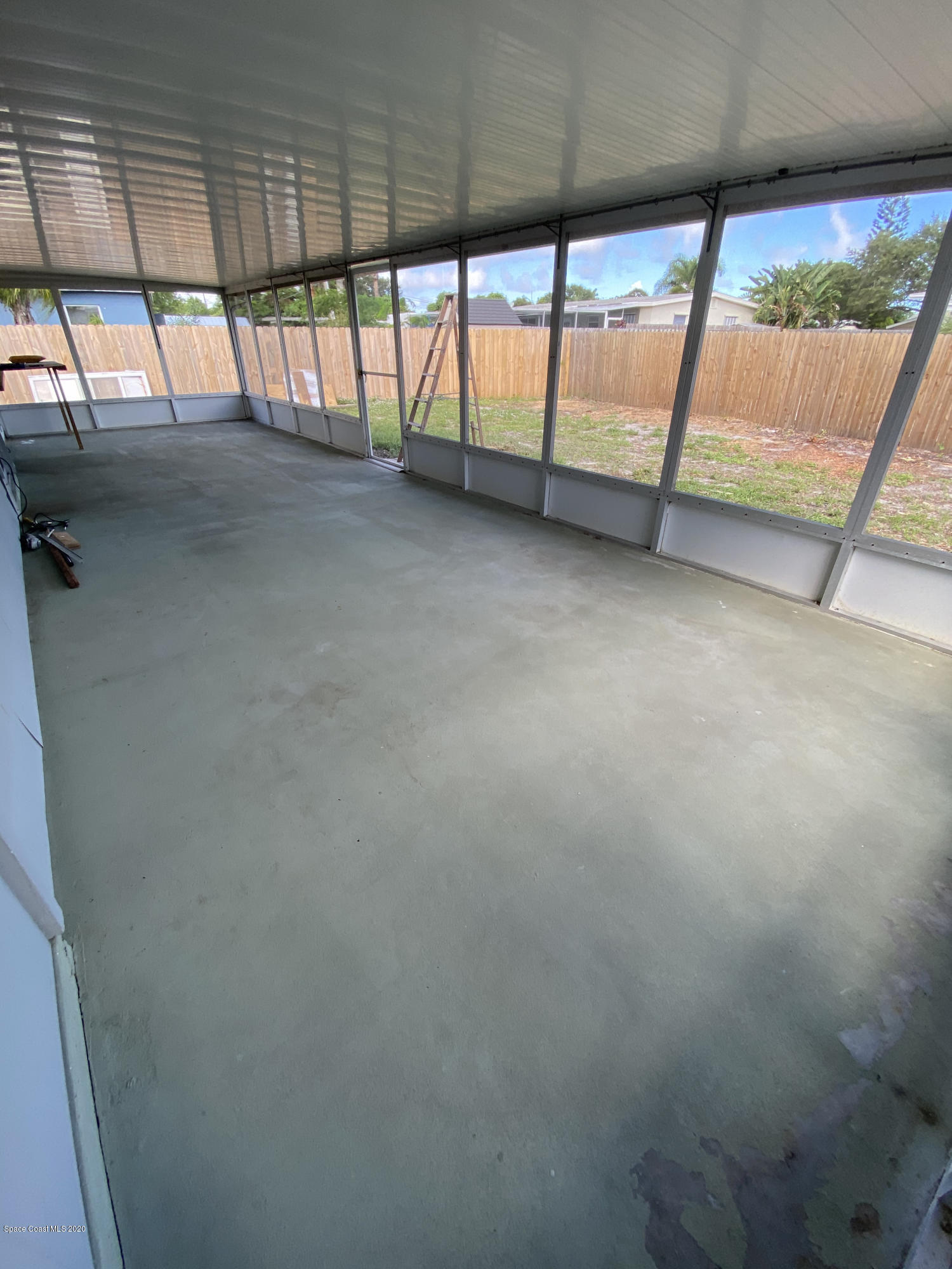 889 Bianca Drive Northeast Palm Bay, FL 32905 - Photo 10 of 12 a view of empty room with wooden floor