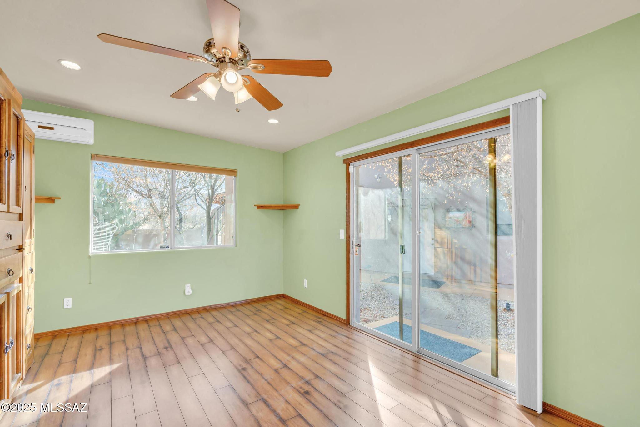 1794 Oahu Court Rio Rico, AZ 85648 - Photo 36 of 48 a view of empty room with wooden floor and fan