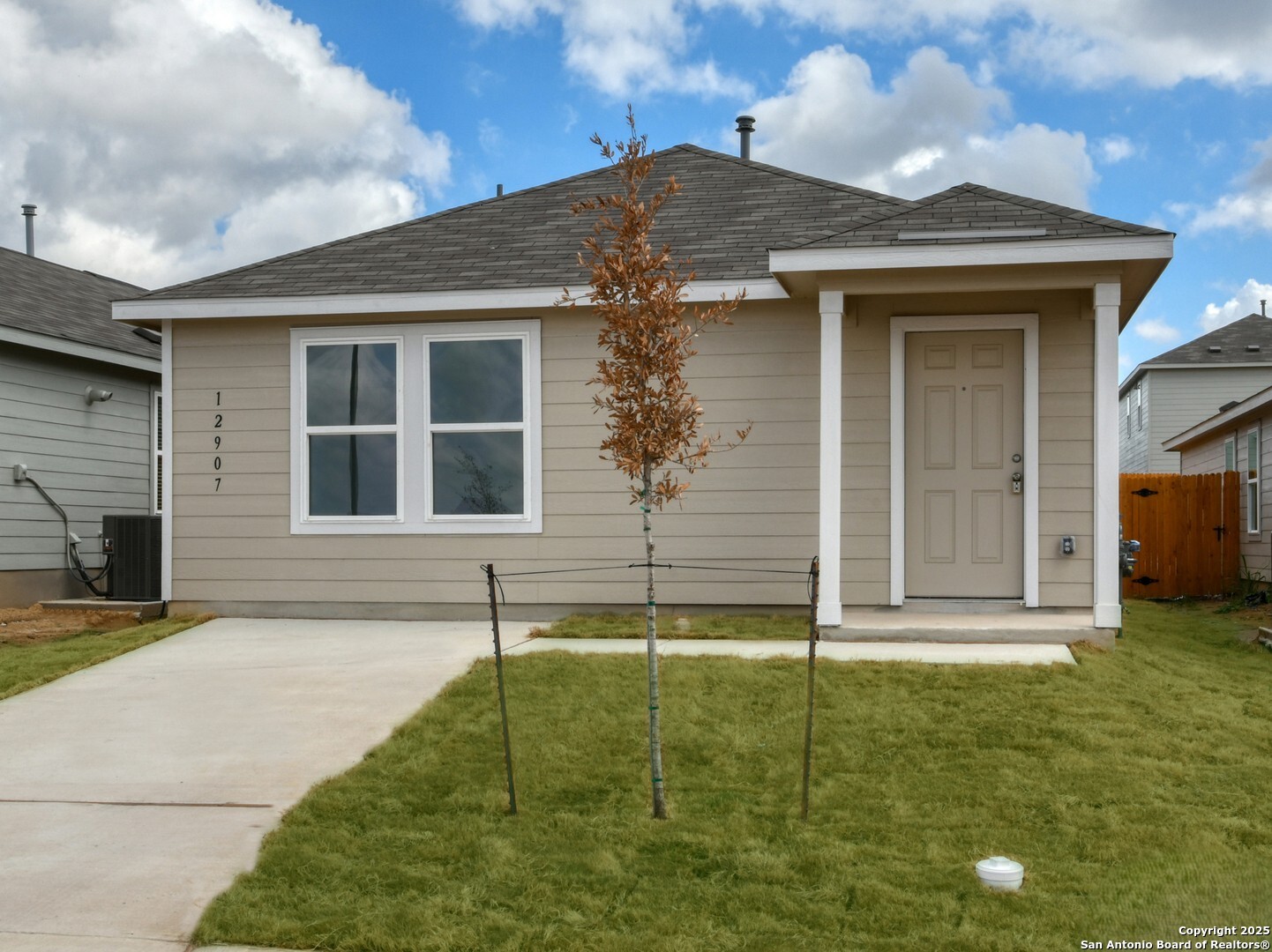 a house that has a window in front of it
