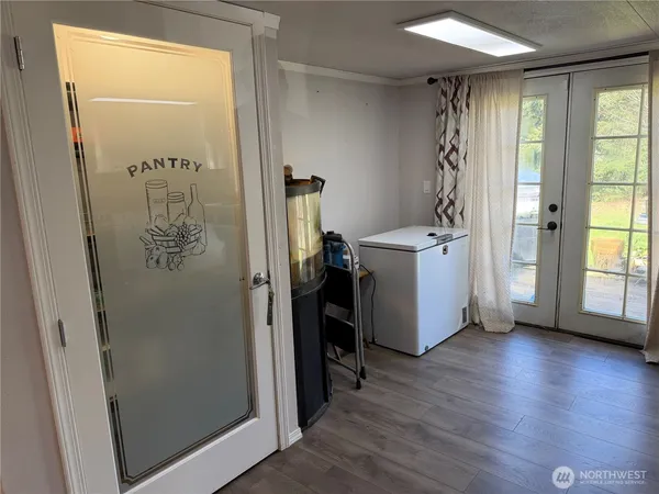 a kitchen with stainless steel appliances granite countertop a refrigerator a stove top oven a sink and dishwasher