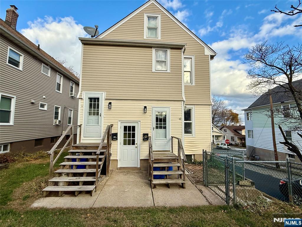 140 Westervelt Avenue, Unit 1 Hawthorne, NJ 07506 - Photo 19 of 20 a front view of a house with stairs
