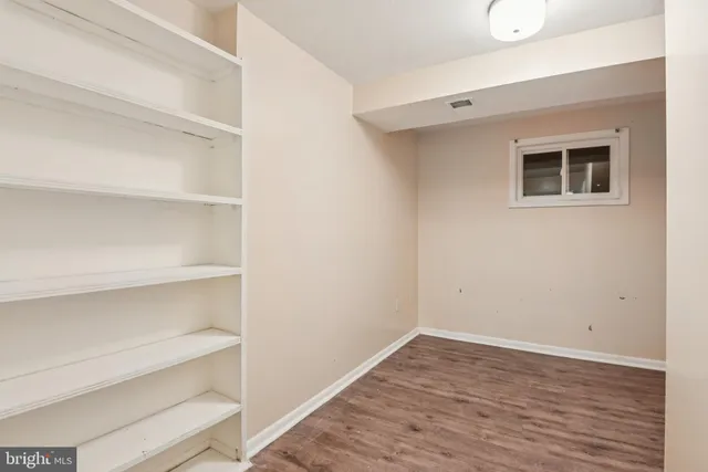 a view of a room with rack on the wall