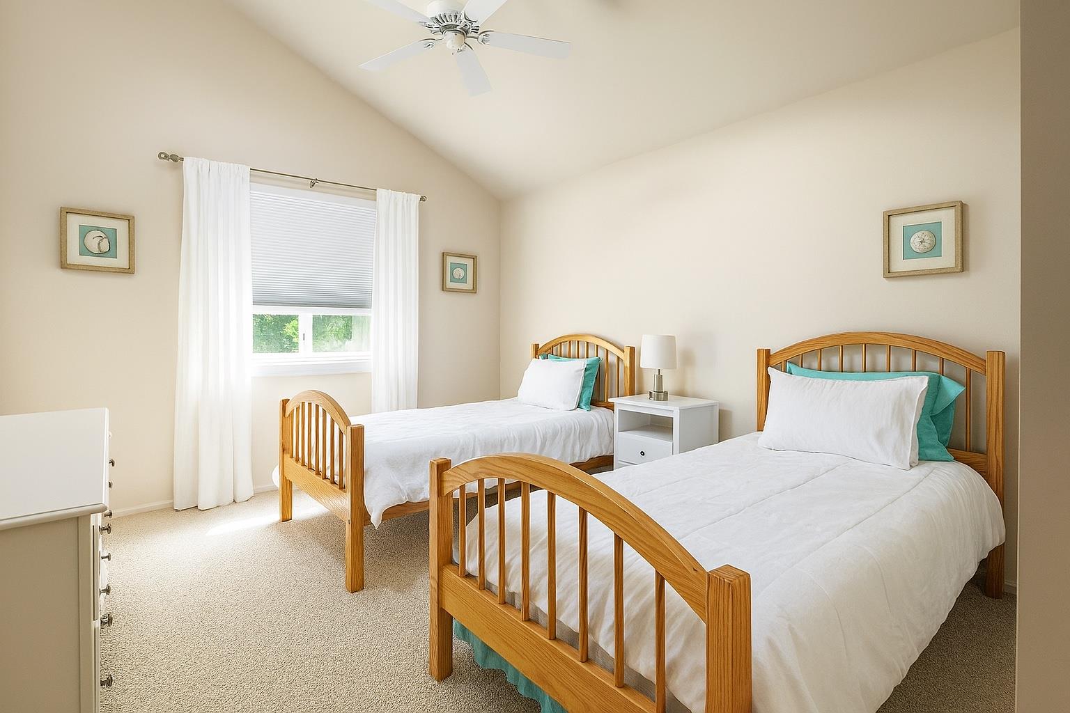 60 Quogue Riverhead Road Quogue, NY 11959 - Photo 17 of 20 a bedroom with two beds and a window