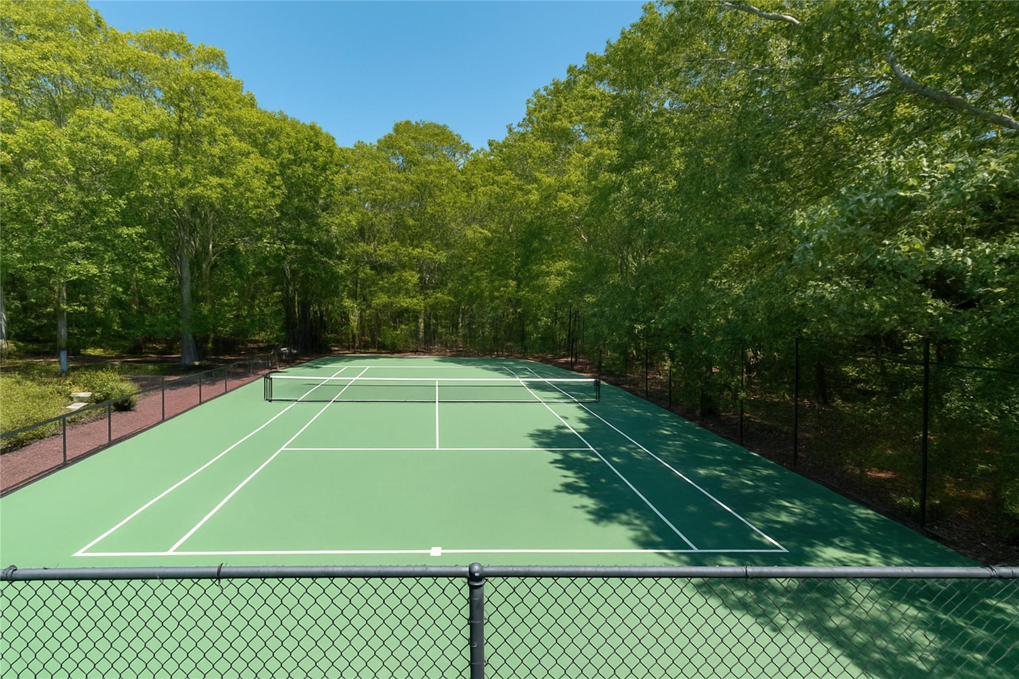 60 Quogue Riverhead Road Quogue, NY 11959 - Photo 2 of 20 a view of a tennis court