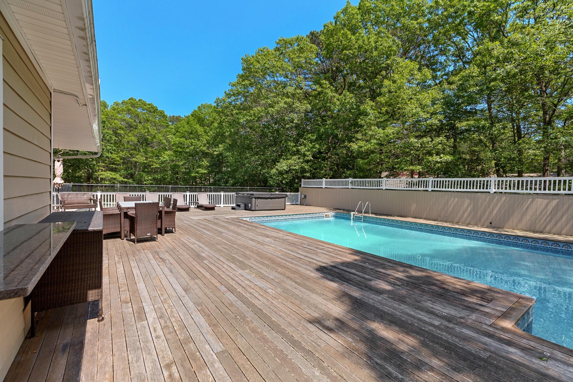 60 Quogue Riverhead Road Quogue, NY 11959 - Photo 4 of 20 a view of a terrace with trees