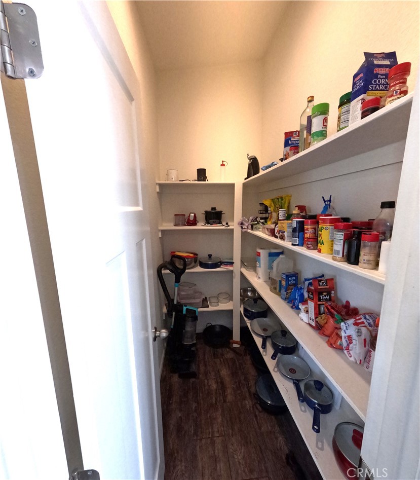 21621 Sandia Road, Unit 130 Apple Valley, CA 92308 - Photo 14 of 45 a room with storage and utility