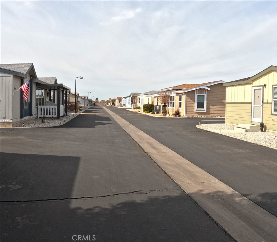 21621 Sandia Road, Unit 130 Apple Valley, CA 92308 - Photo 3 of 45 a view of a house with a street