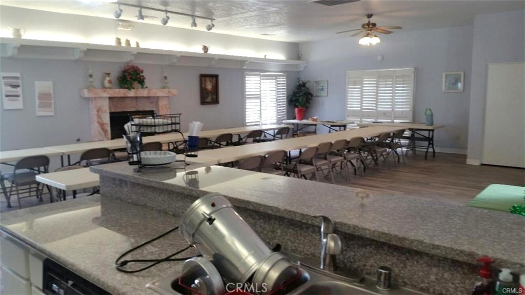 21621 Sandia Road, Unit 130 Apple Valley, CA 92308 - Photo 41 of 45 a living room with patio furniture and a window