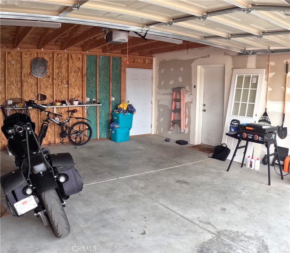 21621 Sandia Road, Unit 130 Apple Valley, CA 92308 - Photo 5 of 45 a view of a room with gym equipment