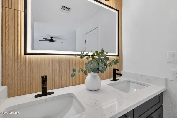 a view of a dining room with a table and chair