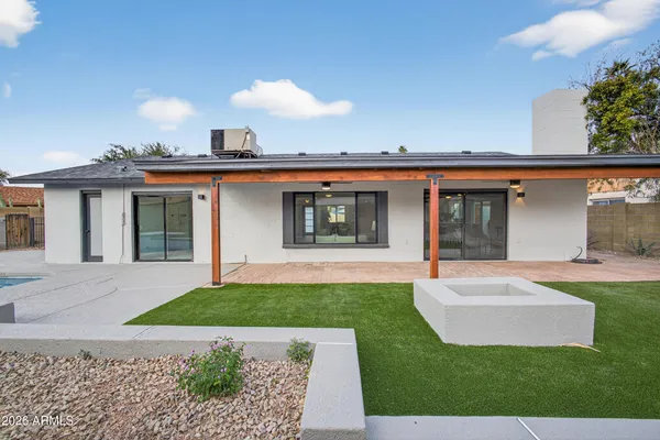 front view of a house with a yard