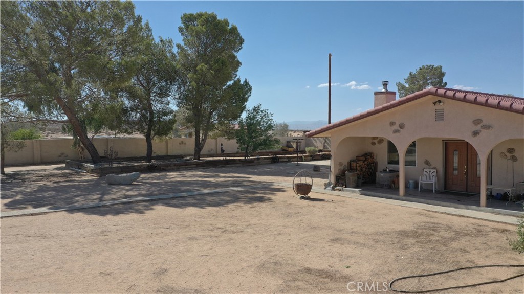 14637 Castle Butte Road North Edwards, CA 93523 - Photo 11 of 18 a view of a house with a yard
